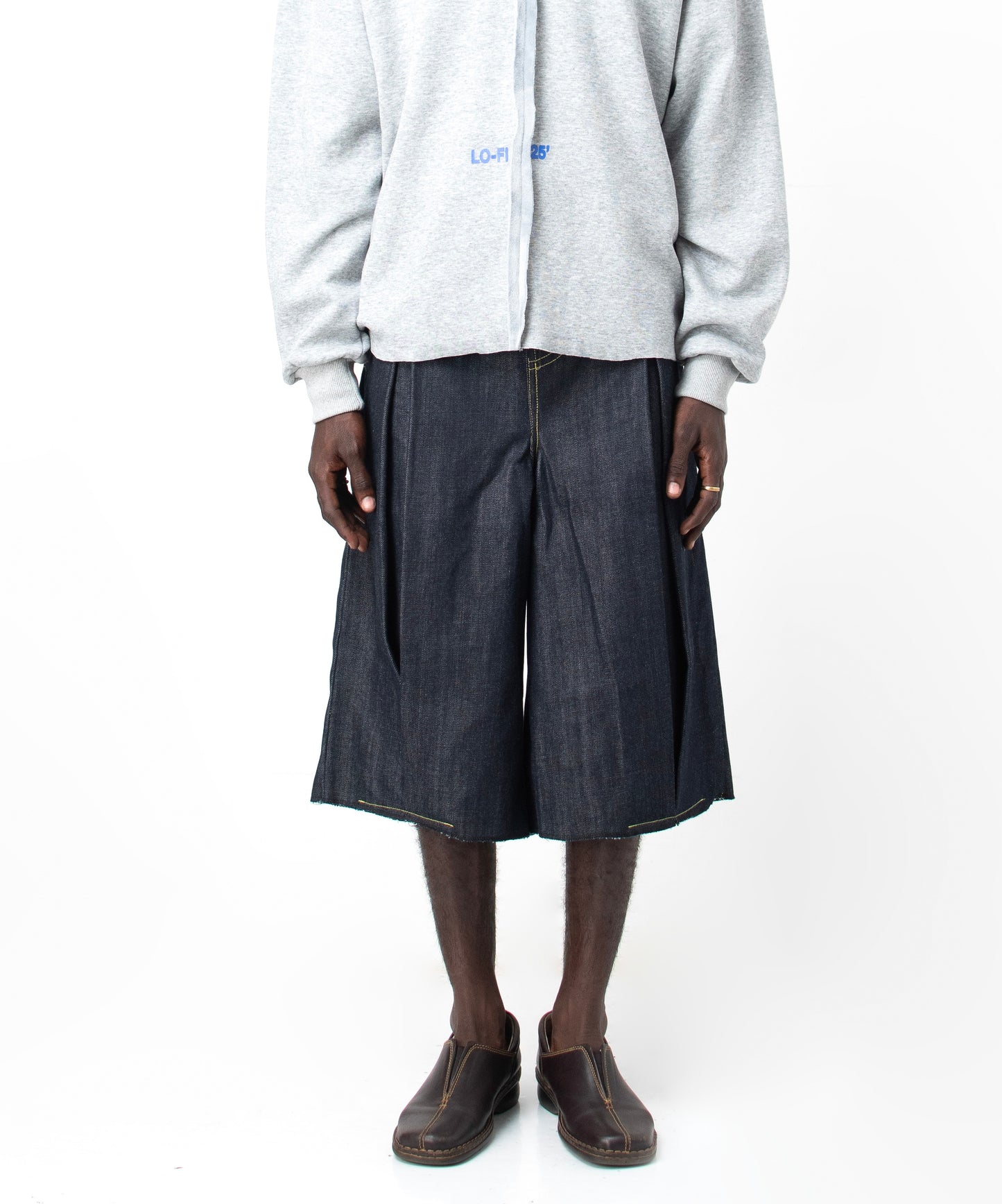 PLEATED DENIM JORTS in navy blue