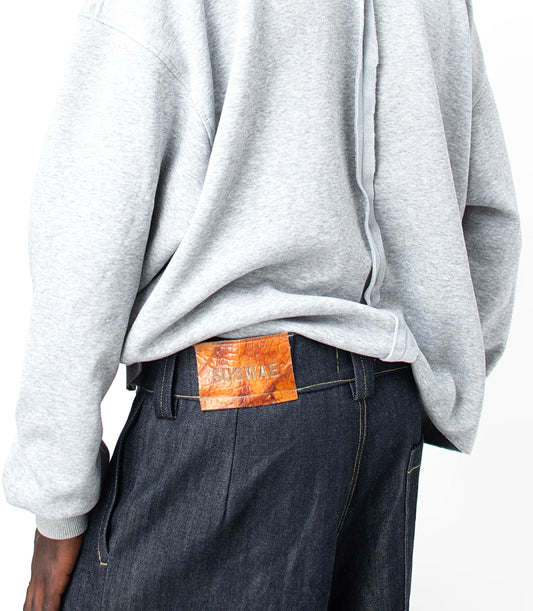 PLEATED DENIM JORTS in navy blue