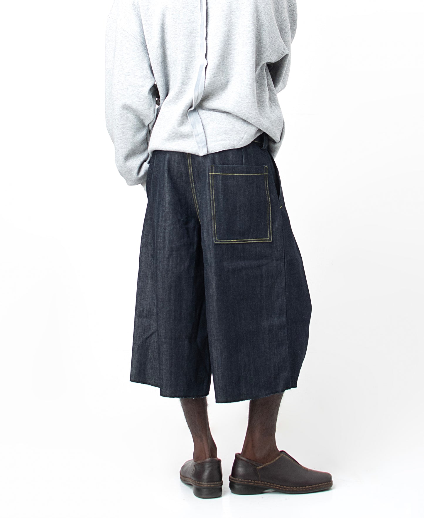 PLEATED DENIM JORTS in navy blue